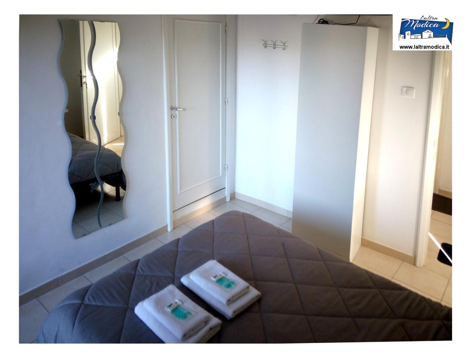 L'Altra Modica Locazione Turistica Apartment Bilik gambar